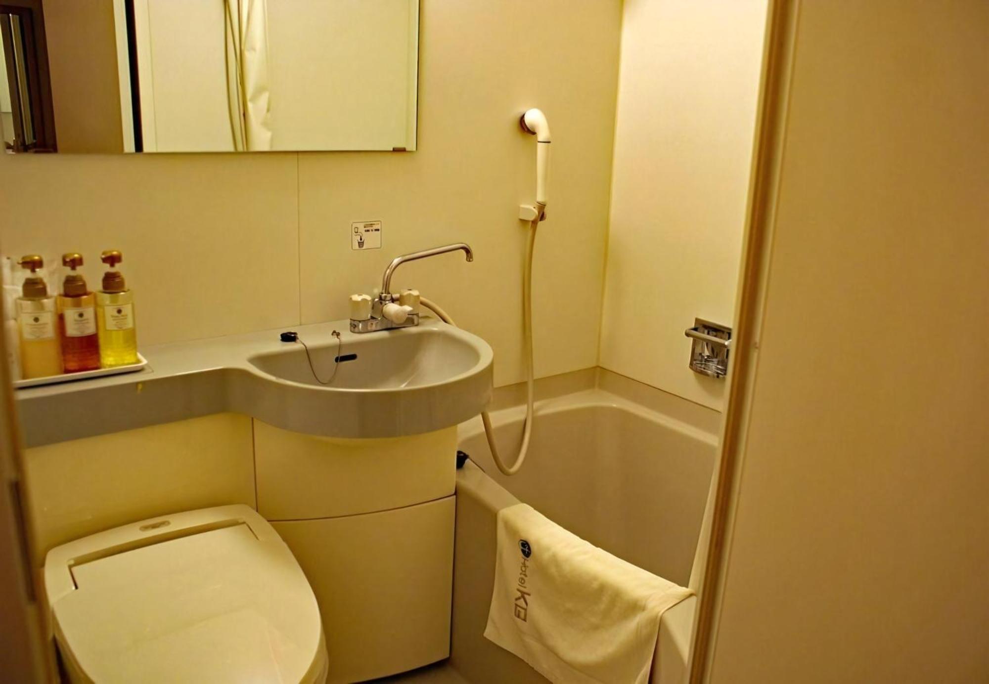 Business Hotel Kg Oita Esterno foto