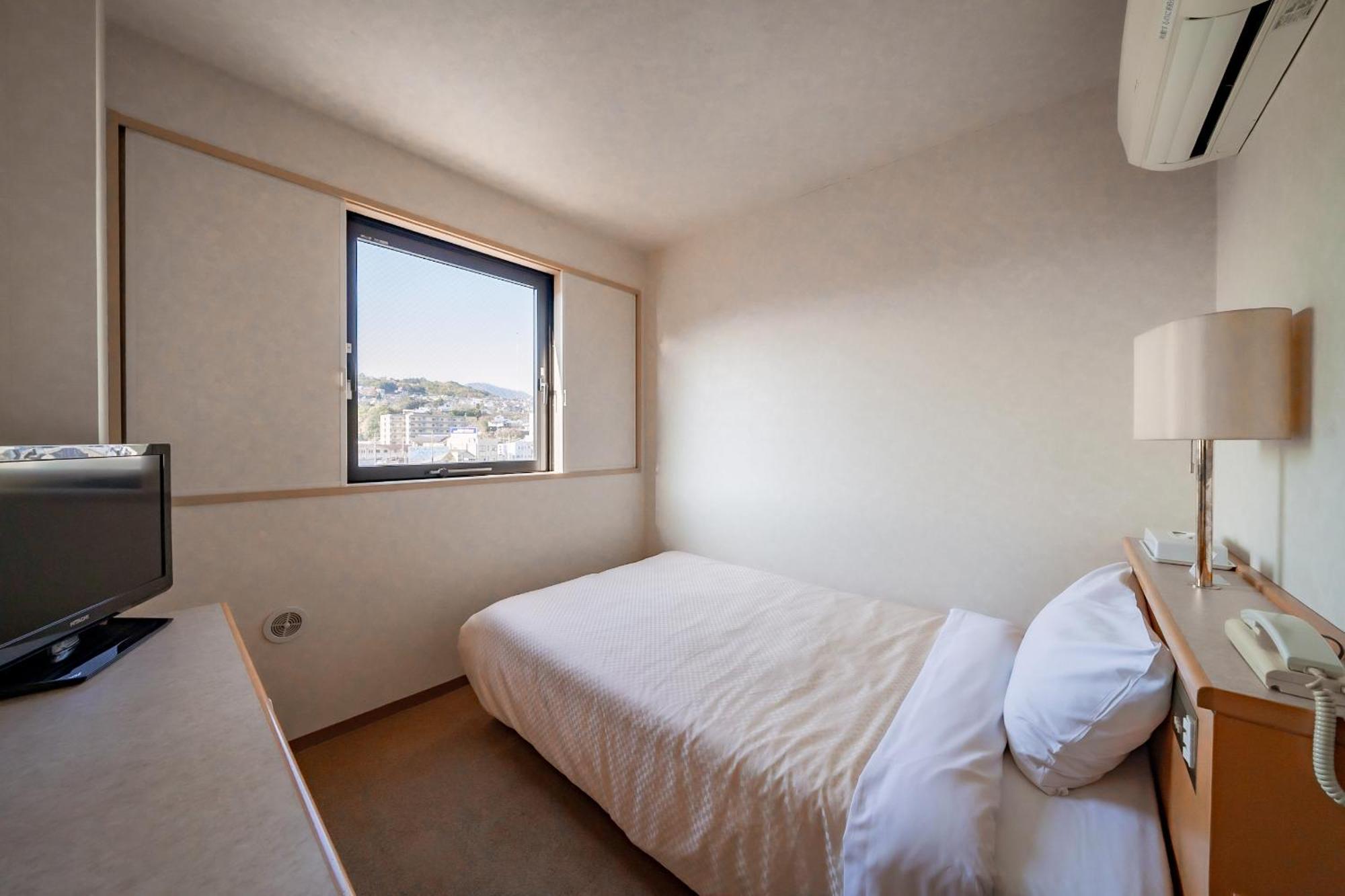 Business Hotel Kg Oita Esterno foto