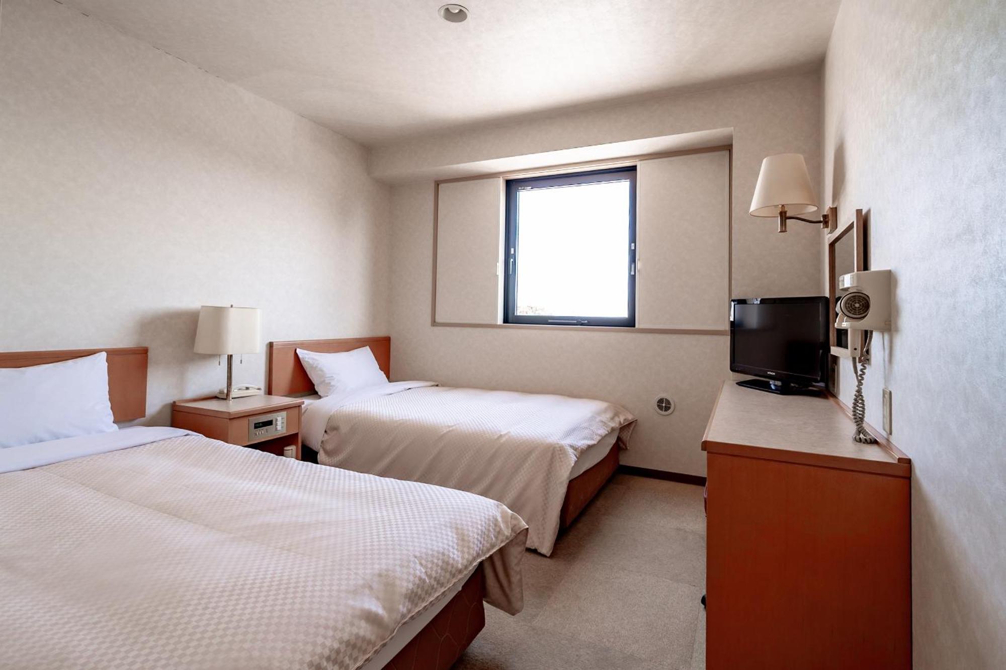 Business Hotel Kg Oita Esterno foto