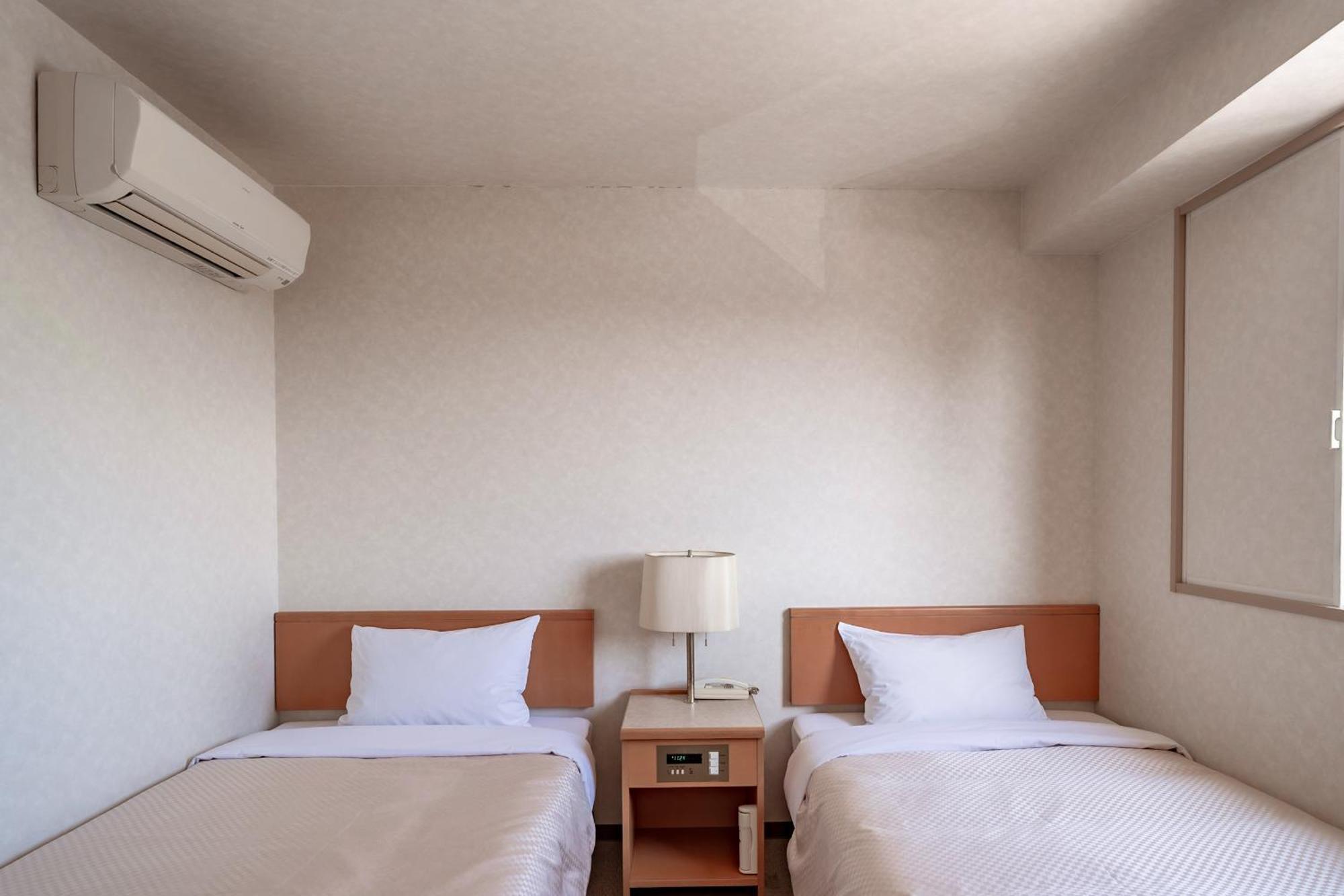 Business Hotel Kg Oita Esterno foto