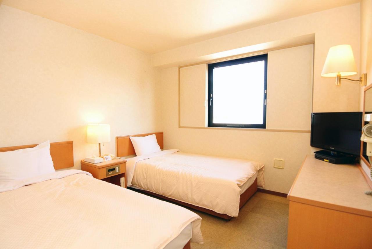 Business Hotel Kg Oita Esterno foto