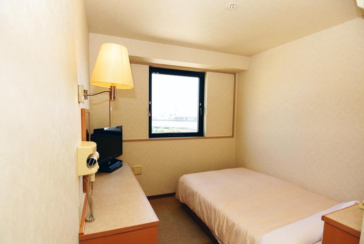Business Hotel Kg Oita Esterno foto
